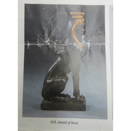 1377 - Style of S. Chenu - a pair of Egyptian Revival style composite Sphinx pier table supports, on rectan... 