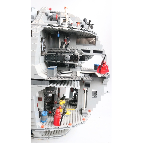 453 - Lego Star Wars 10188 Death Star with box and instruction manual, set has been built up and is obviou... 