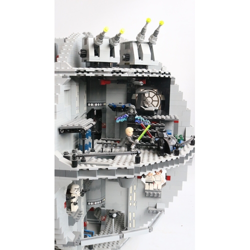 453 - Lego Star Wars 10188 Death Star with box and instruction manual, set has been built up and is obviou... 