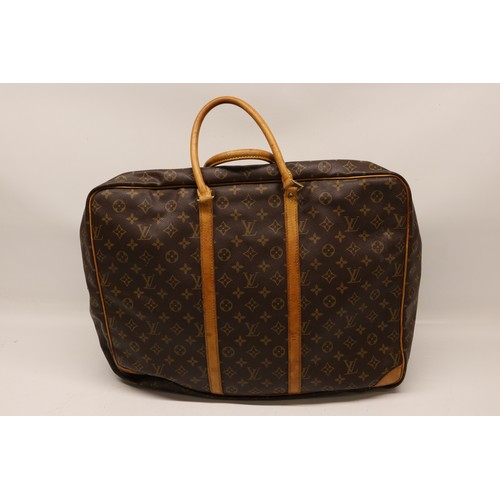 83 - WITHDRAWN - The Bobby Davro Collection: Louis Vuitton Sirius 50 soft sided suitcase, monogrammed can... 