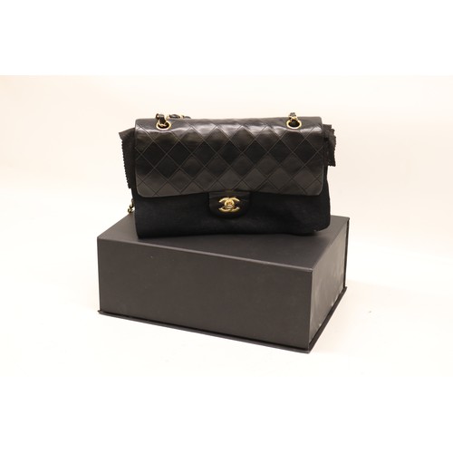 WITHDRAWN - The Bobby Davro Collection: Chanel classic medium double flap bag, black quilted caviar leather with burgundy leather lining with gold plated hardware, gold and black leather woven double strap, with original box, dust bag, paperwork and bag, circa 2011, 26.5cm x 16cm x 7cm
Bradley's Shipping £33.00 plus vat (UK Only)