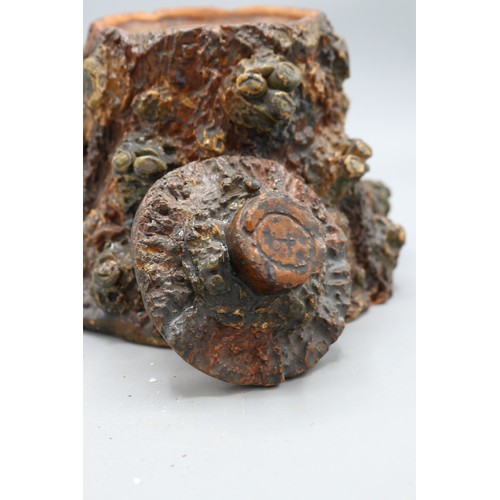 1009 - Earthenware tobacco jar with lid, modelled with gnarly branch stumps, barkware, inscribed 'J walker'... 
