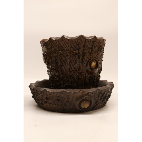 1017 - A pair of earthenware plant pots with matching trays, designed in a barkware style. Each pot feature... 