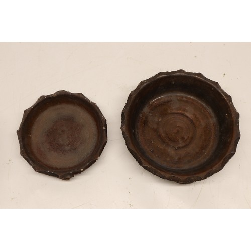 1017 - A pair of earthenware plant pots with matching trays, designed in a barkware style. Each pot feature... 