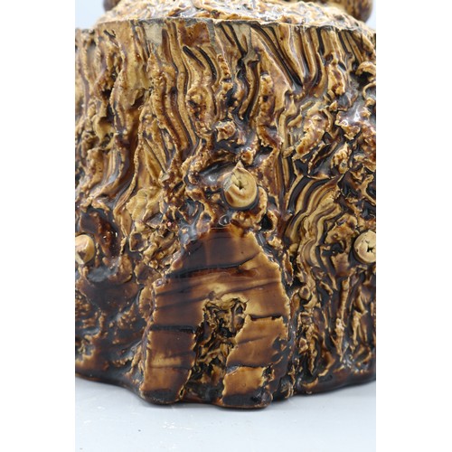 1010 - Earthenware tobacco jar with barkware slip decoration, featuring gnarly branch and bark effect detai... 