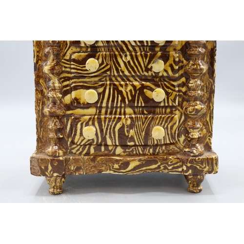 1021 - Agate ware miniature chest of drawers, dated 1874, likely Elland Halifax, slipware, H19cm
Bradley's ... 