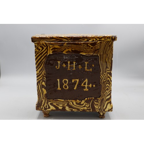 1021 - Agate ware miniature chest of drawers, dated 1874, likely Elland Halifax, slipware, H19cm
Bradley's ... 