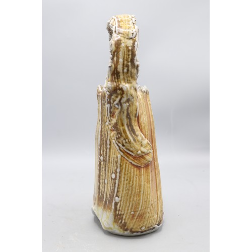 1048 - Ruthanne Tudball (1948-) top handled basket vase, soap glaze, impressed mark to the base, H29.5cm
Br... 