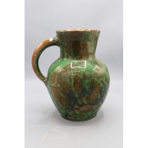1072 - Edwin Beer Fishley (1832-1912), Fremington stoneware jug, green mottled glaze, signed to the base, H... 