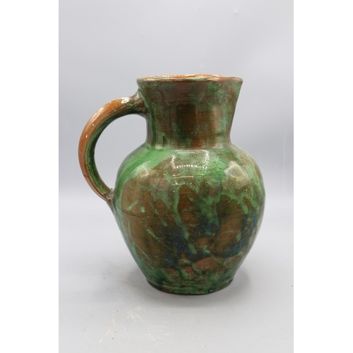 1072 - Edwin Beer Fishley (1832-1912), Fremington stoneware jug, green mottled glaze, signed to the base, H... 