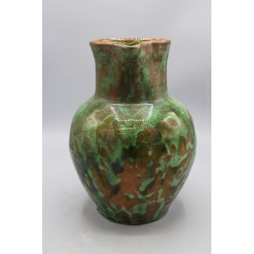 1072 - Edwin Beer Fishley (1832-1912), Fremington stoneware jug, green mottled glaze, signed to the base, H... 