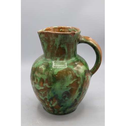 1072 - Edwin Beer Fishley (1832-1912), Fremington stoneware jug, green mottled glaze, signed to the base, H... 