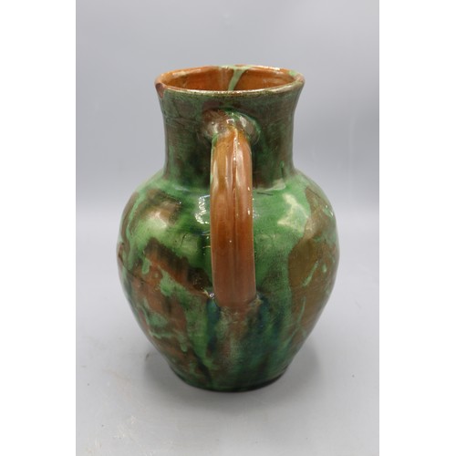 1072 - Edwin Beer Fishley (1832-1912), Fremington stoneware jug, green mottled glaze, signed to the base, H... 