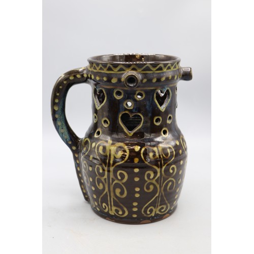 1006 - Peter Currell Brown, Snake Pottery, Puzzle Jug heart detailing, 'Drink Your Fill But Do Not Spill'; ... 