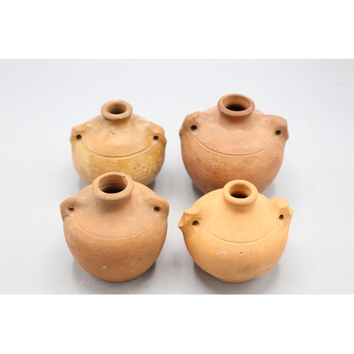 1069 - Two Verwood for Liberty, London, stoneware costrels, Liberty stamp to base, Rd No. 517683 and two ot... 