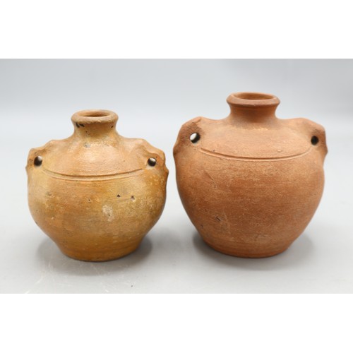 1069 - Two Verwood for Liberty, London, stoneware costrels, Liberty stamp to base, Rd No. 517683 and two ot... 