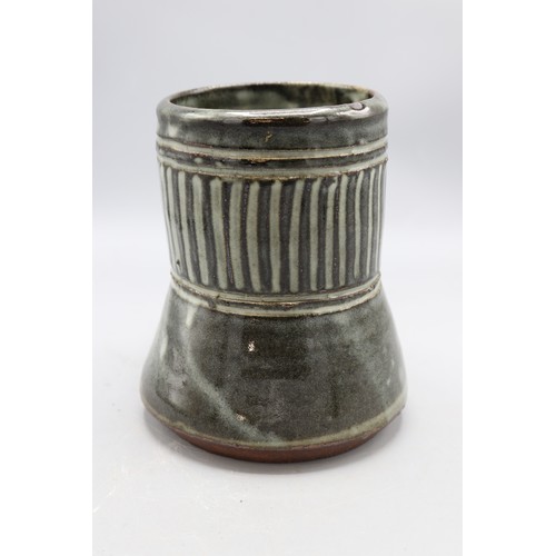 1090 - Abuja Pottery stoneware tankard, cylindrical spread form, blue glazed, possibly Ladi Kwali, H15cm
Br... 