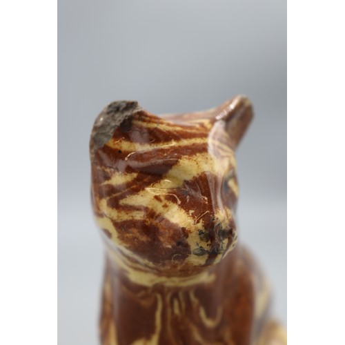 1066 - Staffordshire style agateware cat, A/F, H14cm
Bradley's Shipping £33.00 plus vat (UK Only)