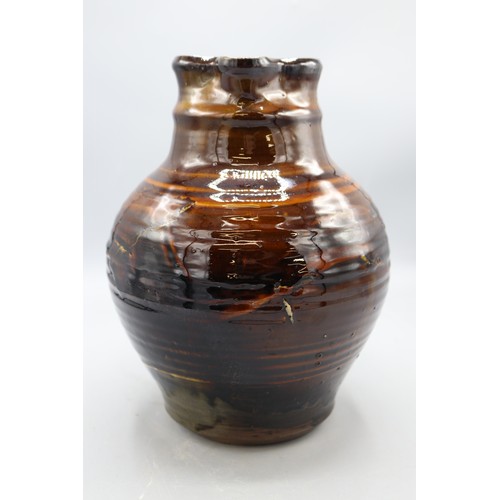 1059 - Charlotte Epton (1902-1970) for Leach Pottery jug, treacle drip glaze, swollen form, scroll detail t... 