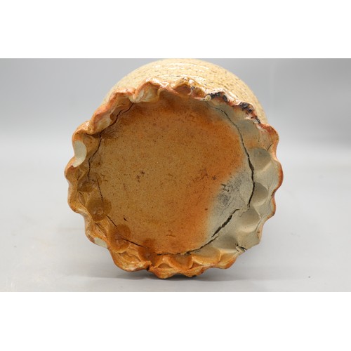 1049 - John Hudson stoneware single handled swollen cylindrical form vase on gadrooned base, H25cm
Bradley'... 