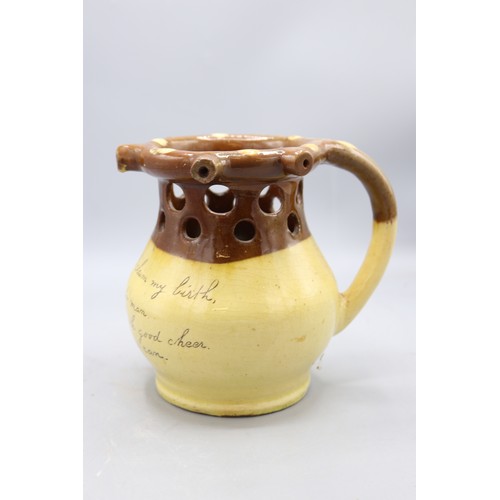 Isaac Button puzzle jug, split salt glaze, inscribed 'From 