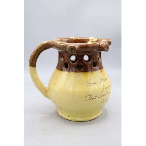 Isaac Button puzzle jug, split salt glaze, inscribed 'From 