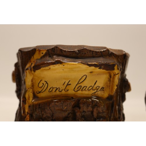1018 - Barkware, slipware tobacco jar, bark effect with branch style handle, inscribed 'Tobacco', H12.5cm; ... 