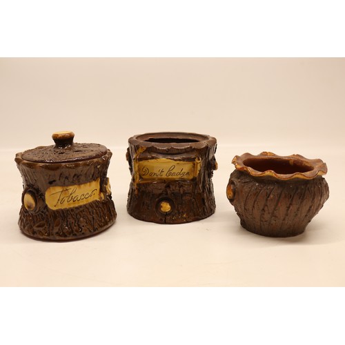 1018 - Barkware, slipware tobacco jar, bark effect with branch style handle, inscribed 'Tobacco', H12.5cm; ... 