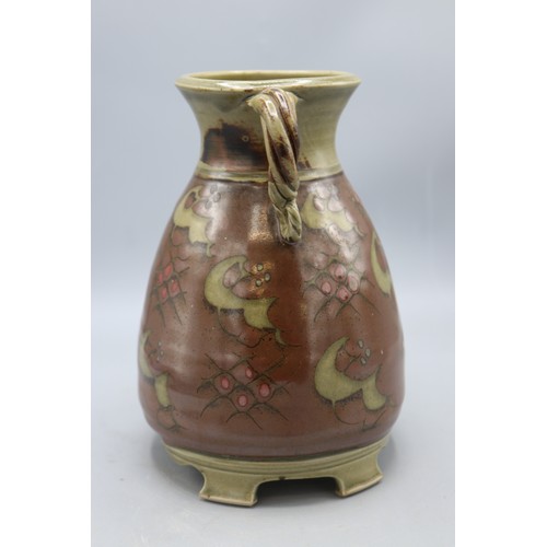 1085 - Paul Muchan (1948-) footed urn shaped vase, twin scroll handles, salt glazed, H21cm
Bradley's Shippi... 