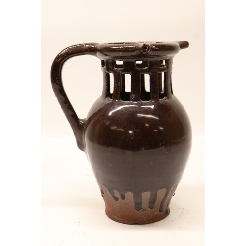 1007 - Puzzle Jug, slipware, treacle drip glaze, H22cm
Bradley's Shipping £38.00 plus vat (UK Only)