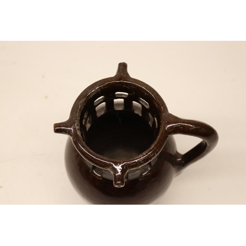 1007 - Puzzle Jug, slipware, treacle drip glaze, H22cm
Bradley's Shipping £38.00 plus vat (UK Only)