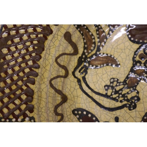 Late 19th century slipware charger, Toft Style, with central female ...