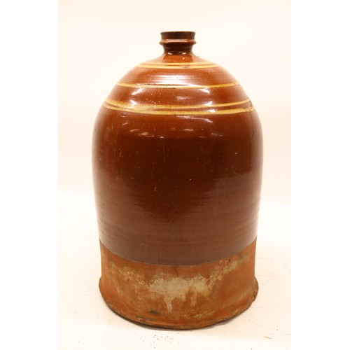 1039 - Slipware flagon, split salt glaze, striped detailing to top portion, cylindrical form, missing handl... 
