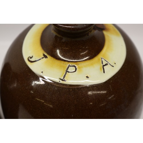 1041 - Two J.P. Appleby flagons, both with split treacle glaze, initialled 'JPA', H32cm max
Bradley's Shipp... 