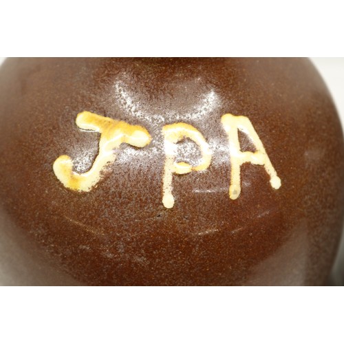 1041 - Two J.P. Appleby flagons, both with split treacle glaze, initialled 'JPA', H32cm max
Bradley's Shipp... 
