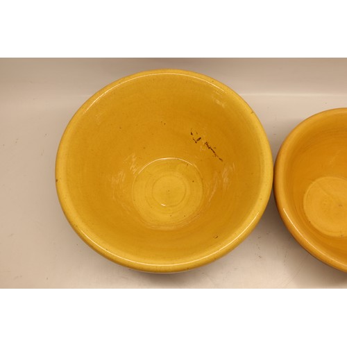 1032 - Two large slipware pancheons, salt glazed inner,  in the manner of Isaac Button, D45cm max
Bradley's... 
