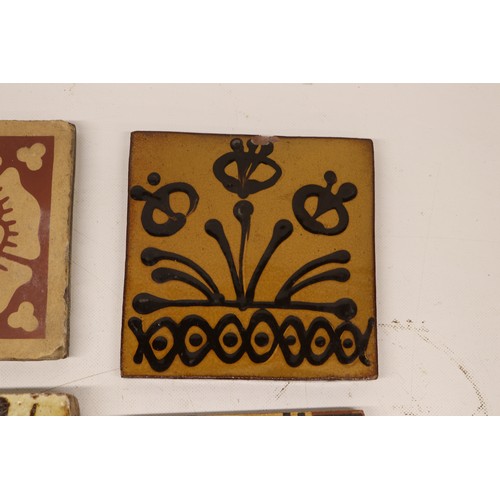 1063 - Collection of tiles, incl. a William Godwin English rose tile, stamped 'W.Godwin Lugwardine Hereford... 