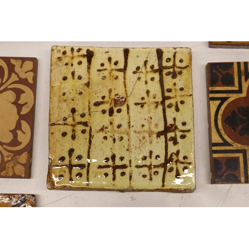 1063 - Collection of tiles, incl. a William Godwin English rose tile, stamped 'W.Godwin Lugwardine Hereford... 