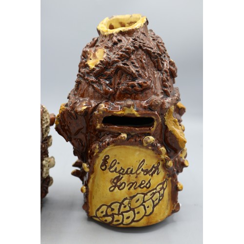 1012 - Barkware tobacco jar with alternate coloured appliques and bird finial, and a bark-ware money box, s... 
