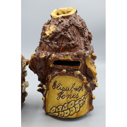 1012 - Barkware tobacco jar with alternate coloured appliques and bird finial, and a bark-ware money box, s... 