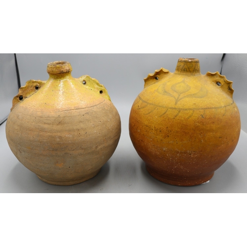 1070 - Verwood costrel/ Dorset Owl with twin handles and another similar costrel with floral details, H20cm... 