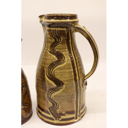 1054 - Matt Grimmitt, two slipware ewer jugs, H27.5cm max
Bradley's Shipping £38.00 plus vat (UK Only)