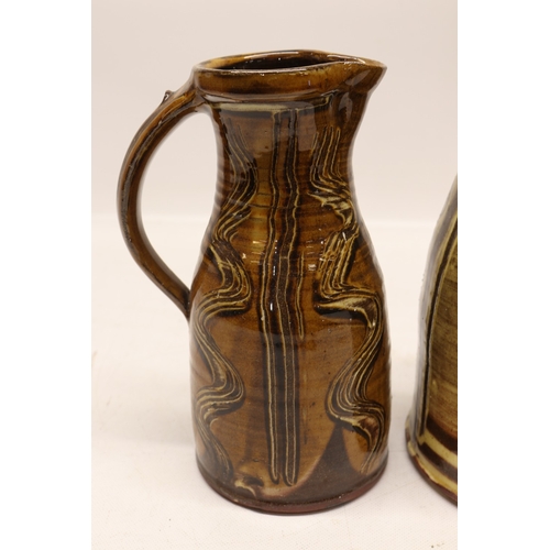1054 - Matt Grimmitt, two slipware ewer jugs, H27.5cm max
Bradley's Shipping £38.00 plus vat (UK Only)