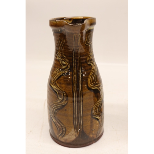 1054 - Matt Grimmitt, two slipware ewer jugs, H27.5cm max
Bradley's Shipping £38.00 plus vat (UK Only)