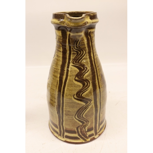 1054 - Matt Grimmitt, two slipware ewer jugs, H27.5cm max
Bradley's Shipping £38.00 plus vat (UK Only)