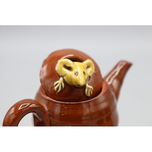 1079 - David Cleverly mouse ware miniature teapot with mouse embedded into the lid; slipware money box in t... 