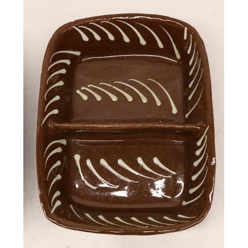 1076 - Two slipware baking dishes with central divisions, dashed contrasting pattern, max W32cm
Bradley's S... 