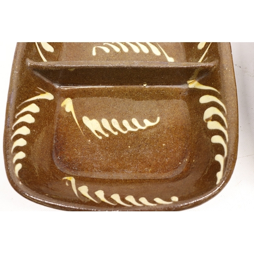 1076 - Two slipware baking dishes with central divisions, dashed contrasting pattern, max W32cm
Bradley's S... 
