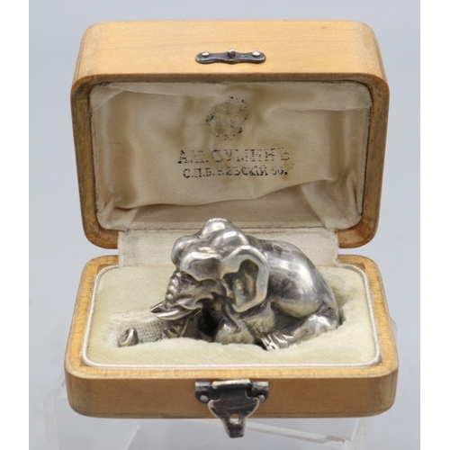 Russian jewelled silver model of an elephant, the eyes set with cabochon rubies, 88 silver purity mark and Julius Rappaport (IP) maker's mark, in a fitted box, 4ozt 125g (later worked for the workshops of Faberge) approx. L5cm W2.5cm H3.2cm
Bradley's Shipping £28.00 plus vat (UK Only)