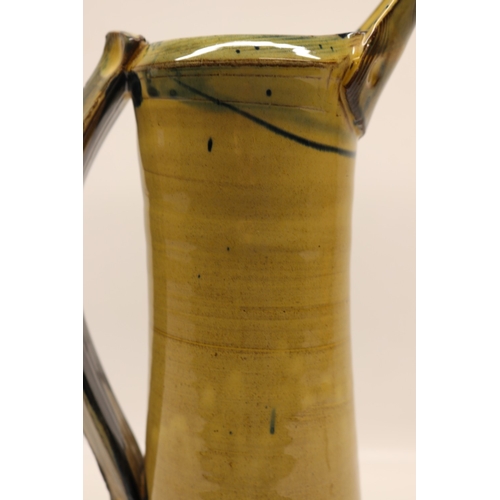 1086 - Richard Phethean, studio ceramic ewer jug, slipware, yellow and blue glaze, H37cm
Bradley's Shipping... 